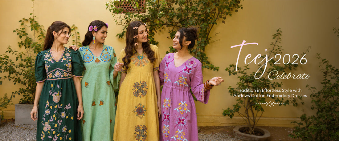 Four models posing outdoors in Aadews Teej 2026 Collection featuring colorful cotton embroidery midi dresses in green, yellow, and purple with intricate floral threadwork.